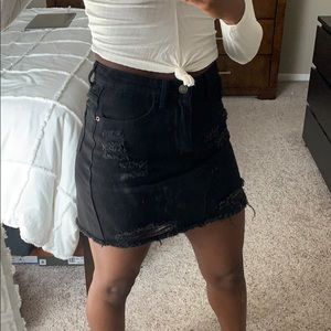 PrettyLittleThing black distressed denim miniskirt